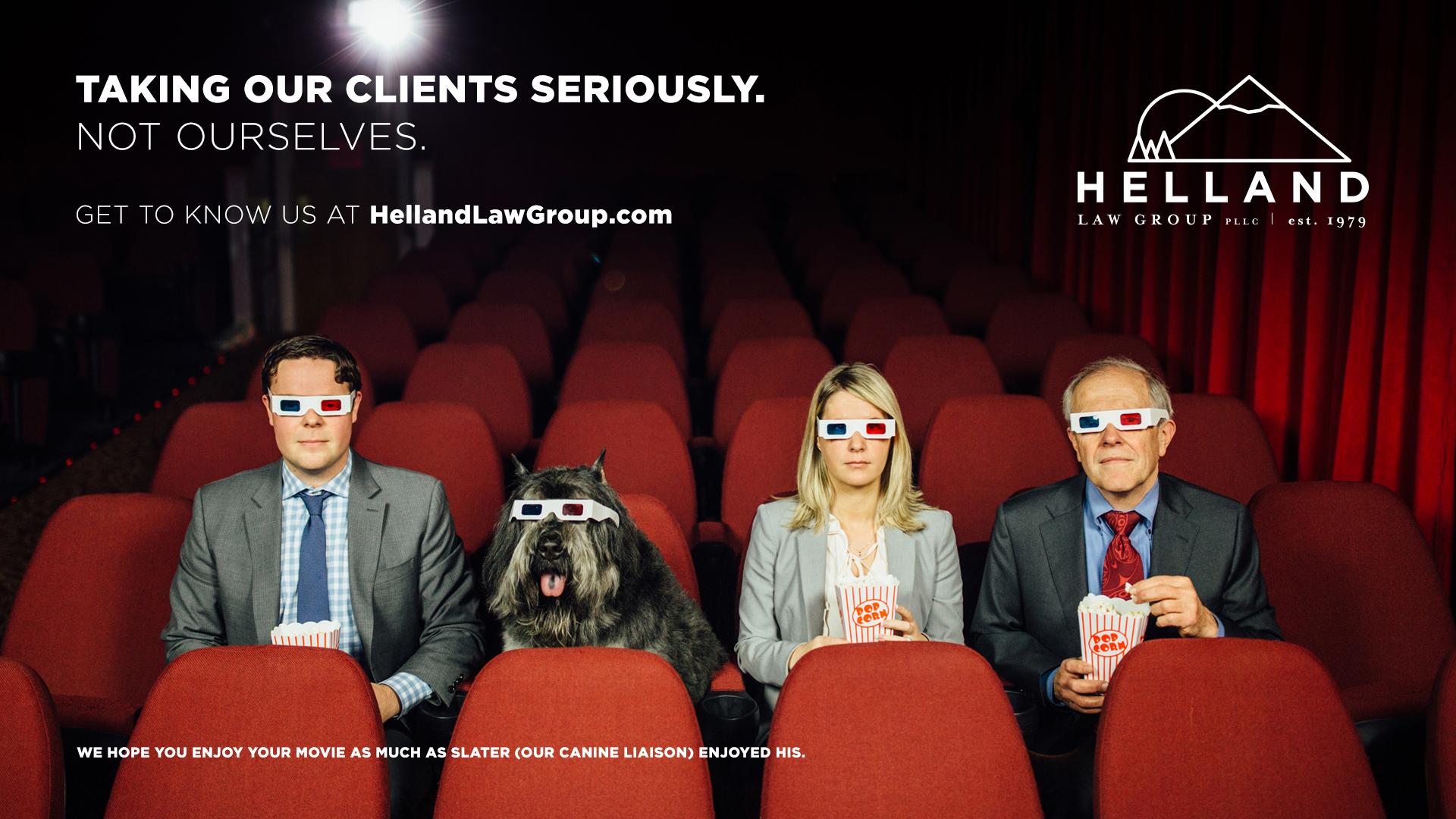 Three lawyers and a dog in an empty movie theater eating popcorn