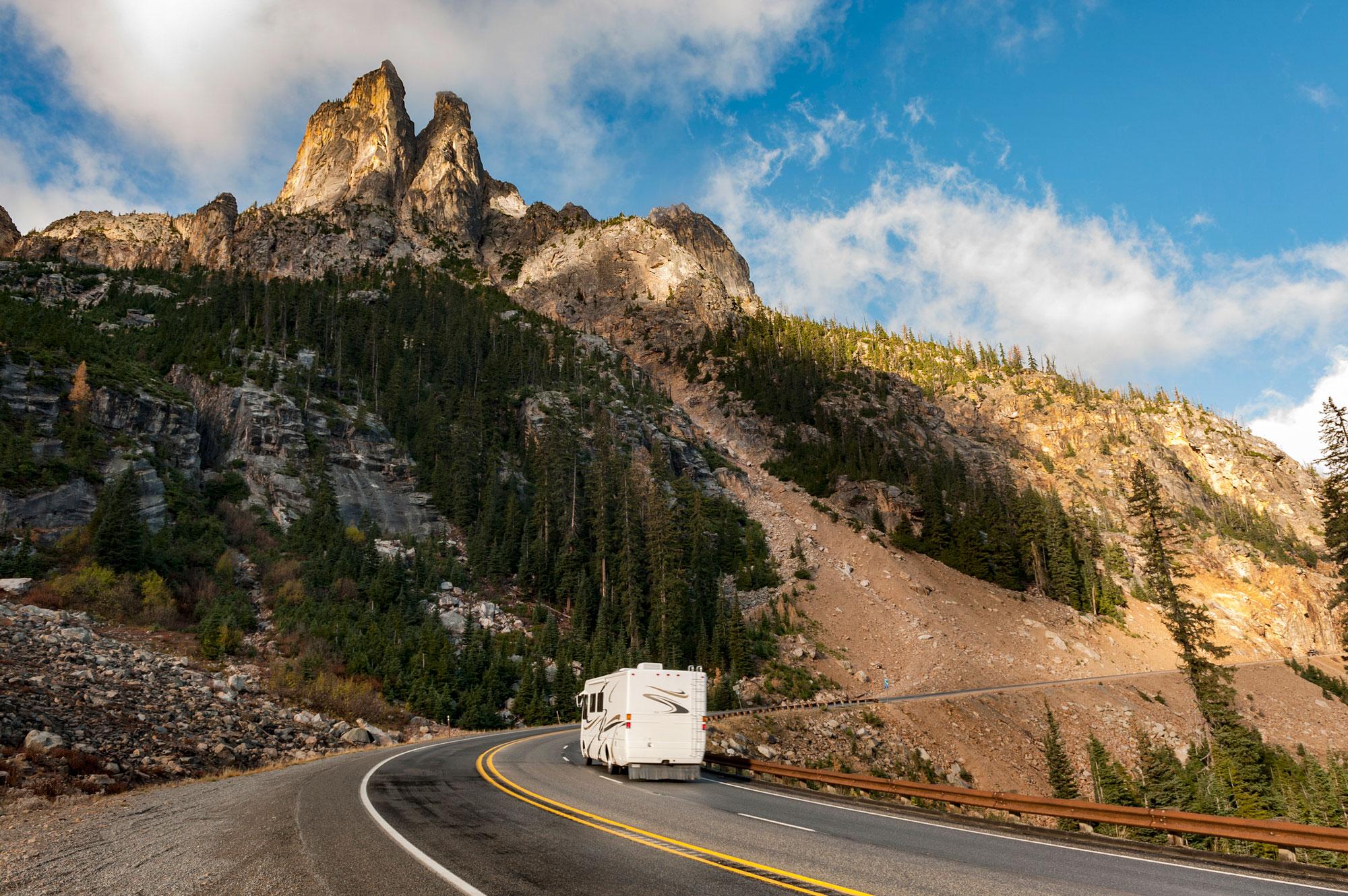 RV driving down a lonely road